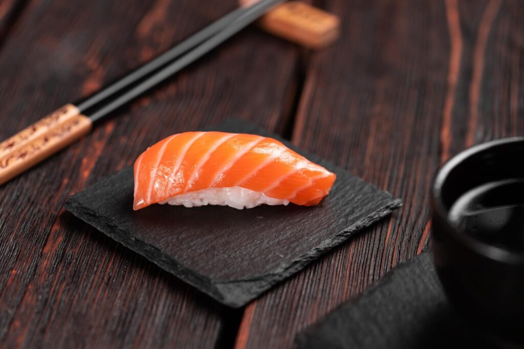 Delicious sushi nigiri wooden background traditional japanese cuisine 230311 42583