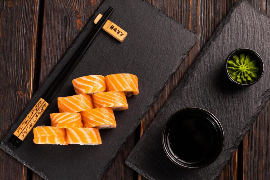 Roll with fish sushi with chopsticks asian food concept 230311 42679
