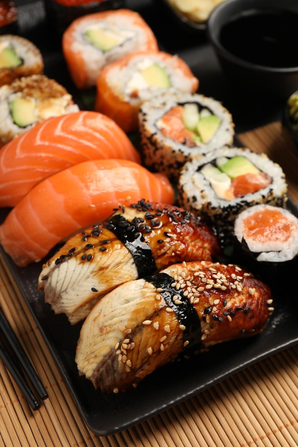 Set delicious sushi rolls mat closeup 495423 77365